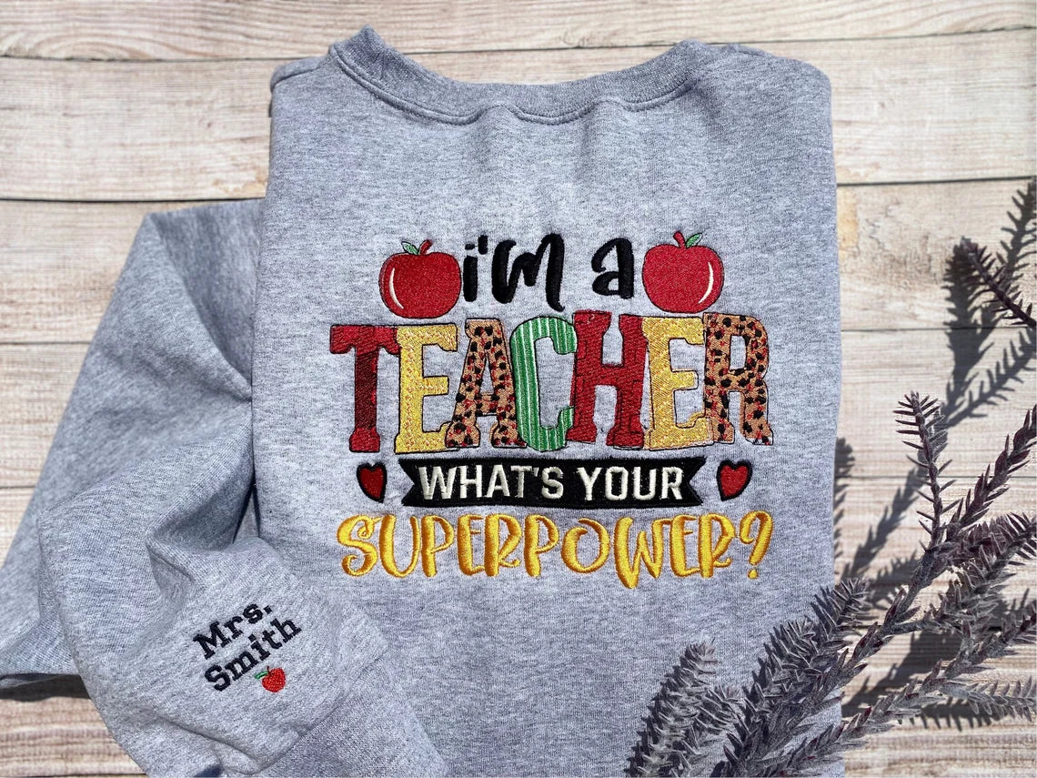 I'm A Teacher What's Your Superpower? Embroidered Sweatshirt
